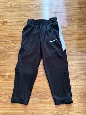 Preloved Nike Boys 4T Black Joggers with white Side Panels and White Swoosh